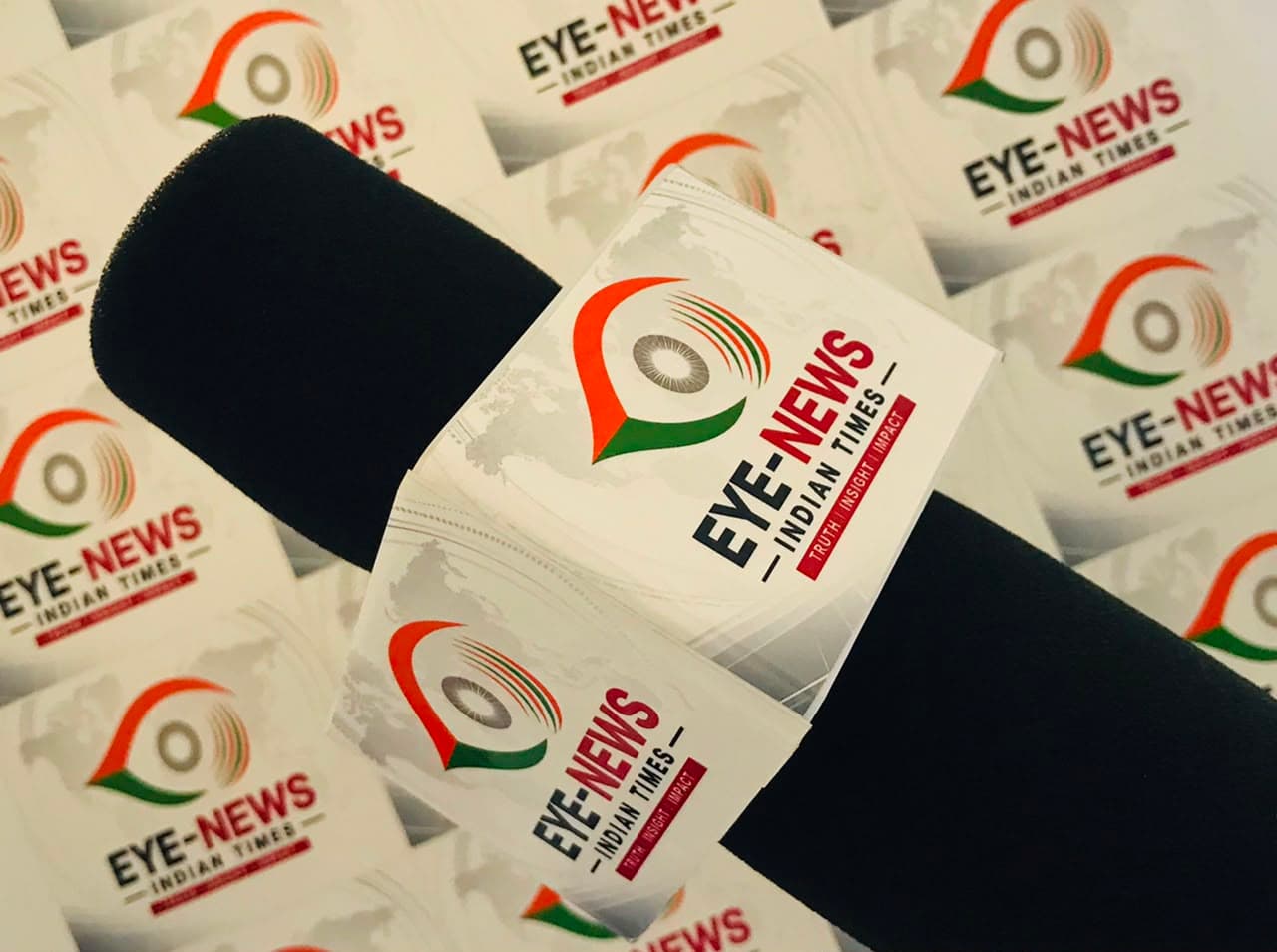 EYE-NEWS INDIAN TIMES branded press mic flag, close up